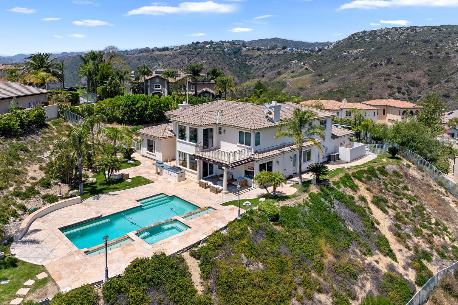 Hillside home with pool and patio, LA real estate.