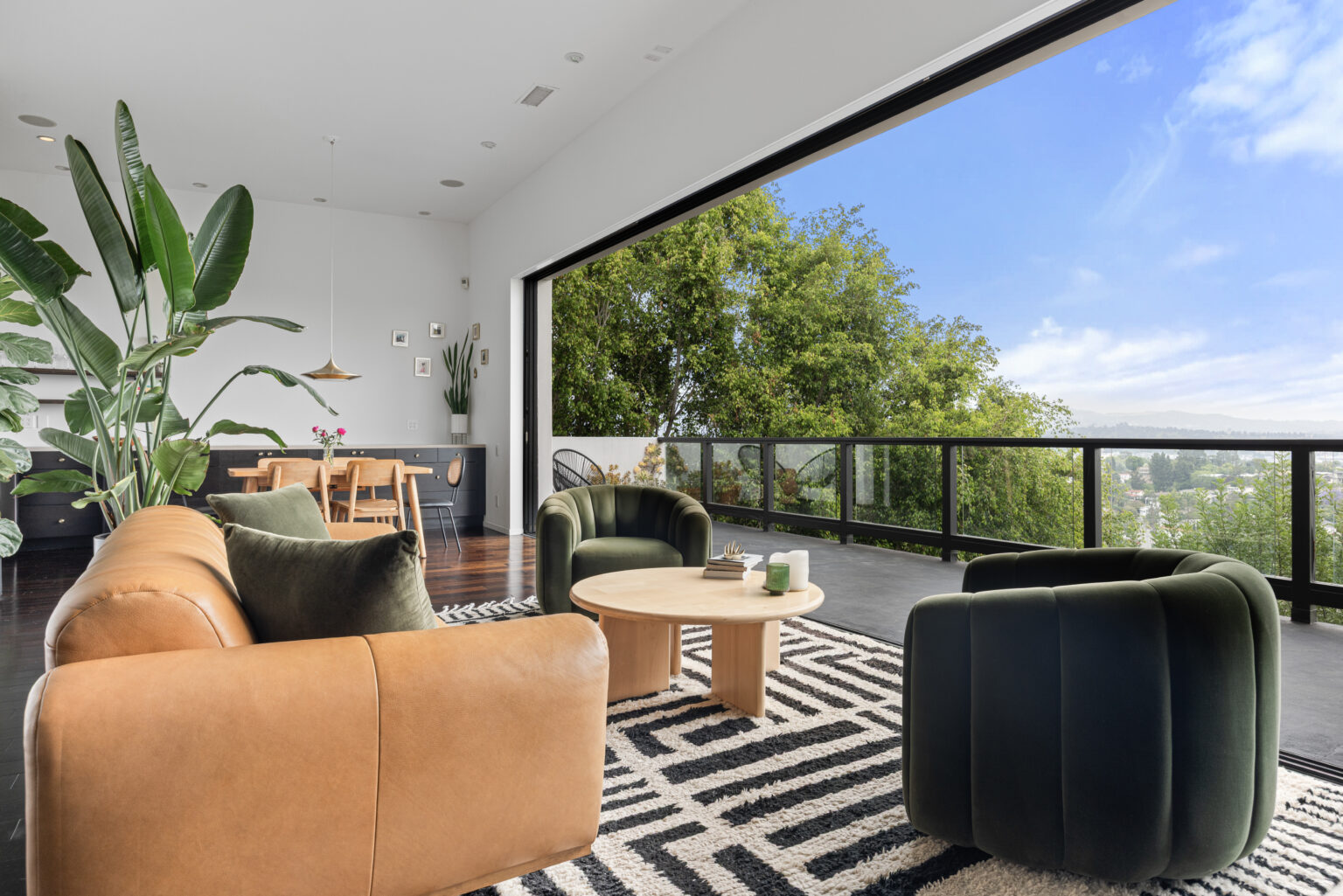 Cozy living and dining corner with patio access, modern LA listing.