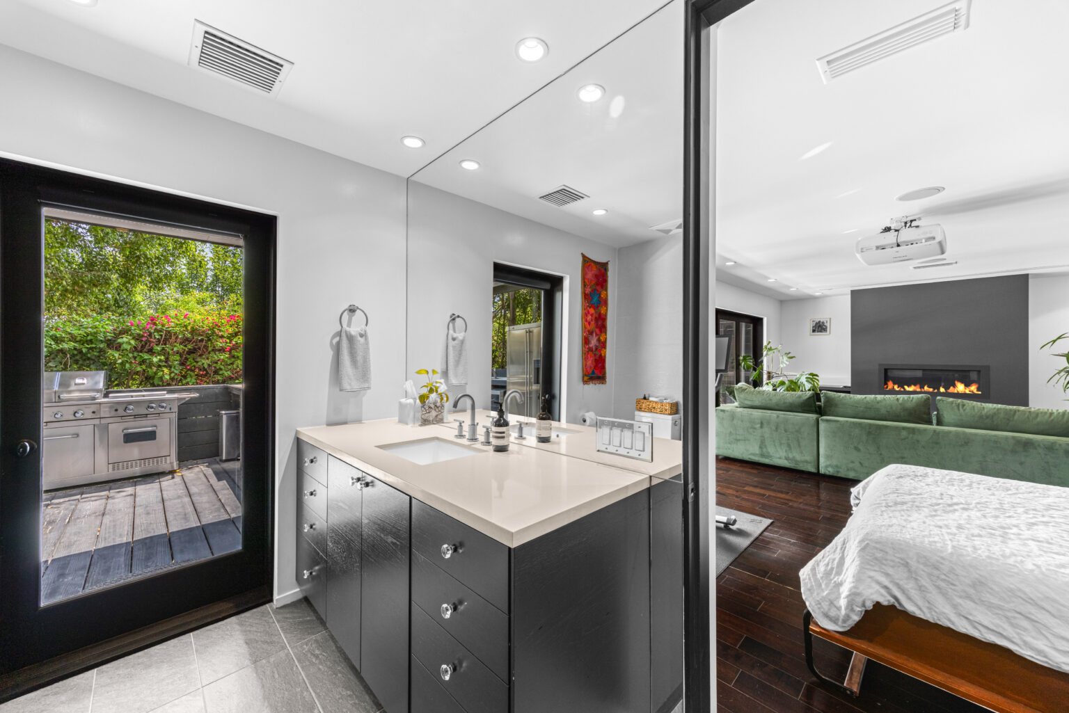 Modern bathroom vanity with double sink and large mirror