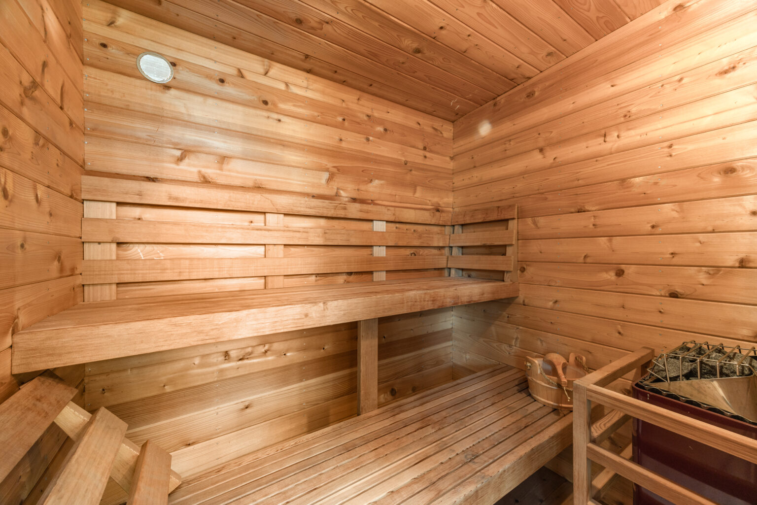 Wooden sauna interior with warm lighting