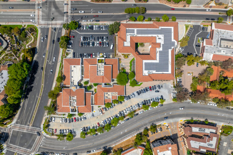 Drone shot of red-roof commercial buildings