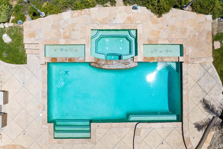 Close-up overhead view of pool and attached spa