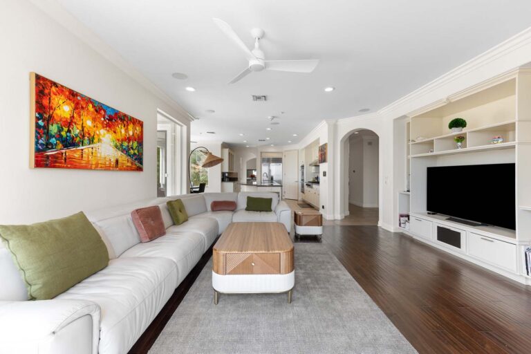 Living room with sectional sofa and colorful artwork