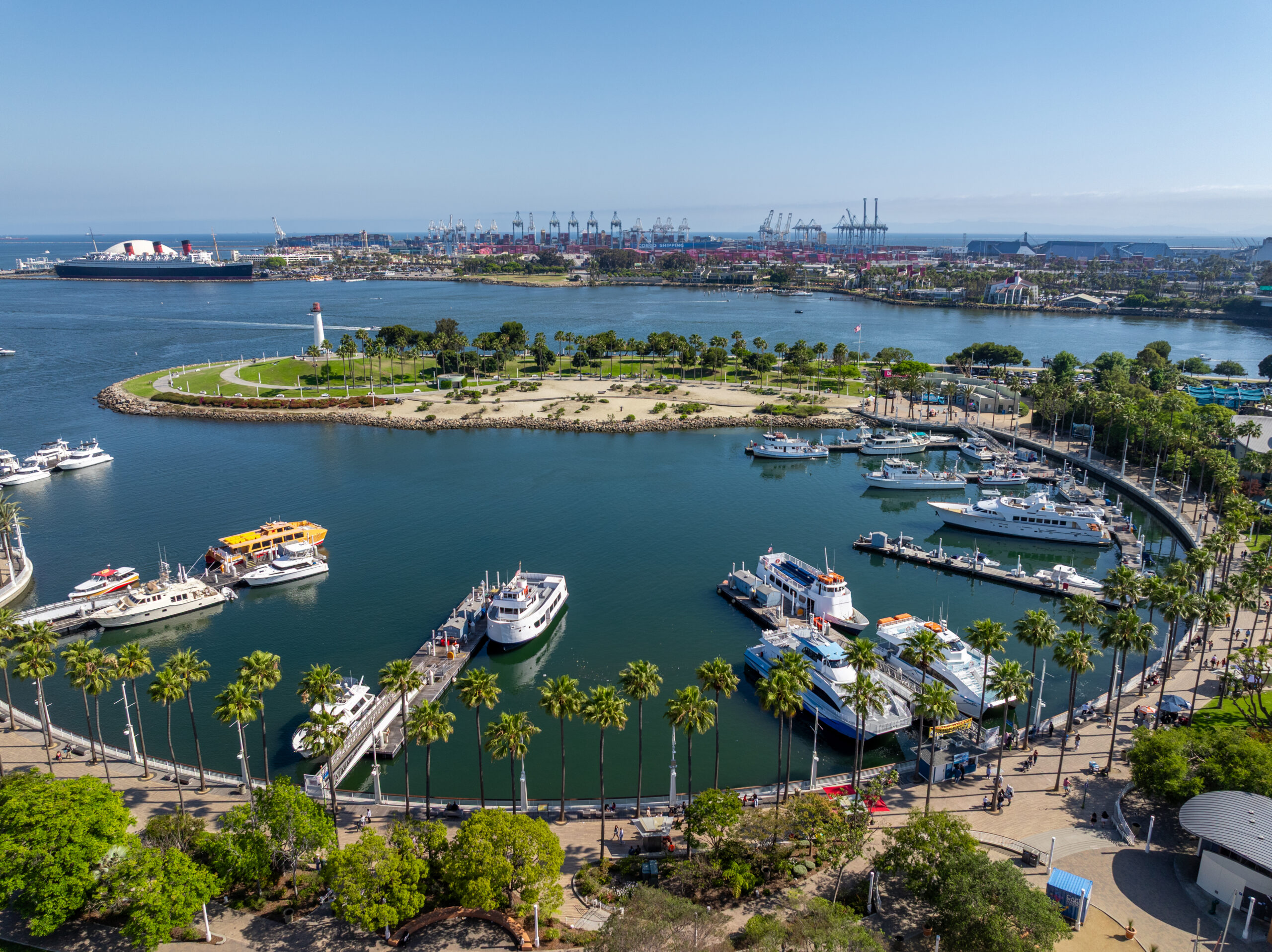 Overhead view of marina with boats and docks in Long Beach, California.